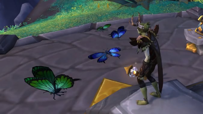 A druid-looking undead holds a lantern while butterflies flit around.