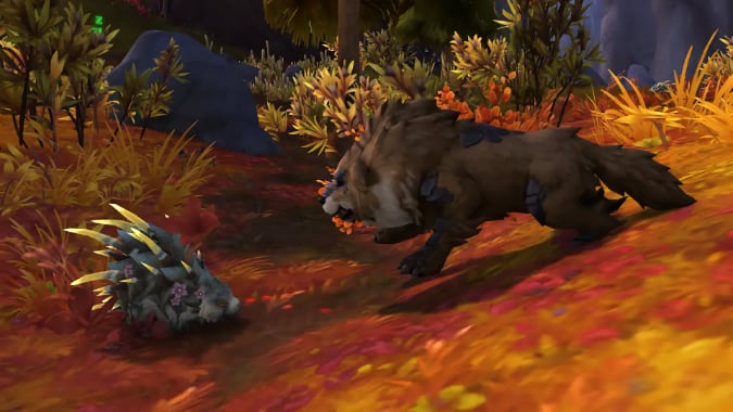 A thick-maned dog-like creature attacks a sparkly porcupine.