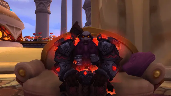 A Dark Iron Dwarf Shaman sits in crimson and black armor in Dalaran.